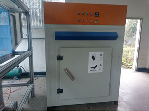 Box oven for valve coating